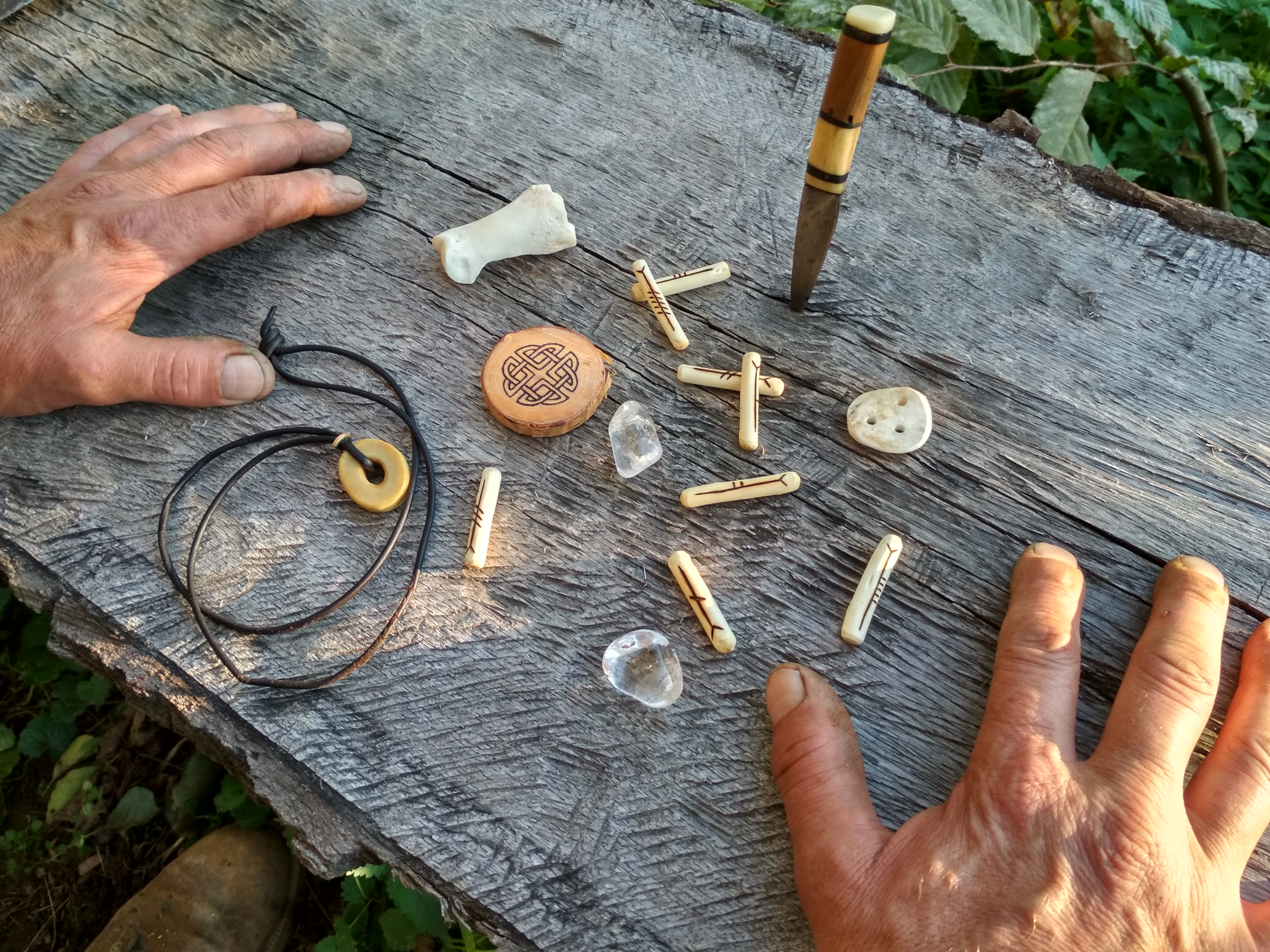 Pagania divination with runes and ogham